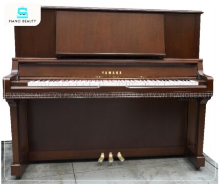 Đàn Piano Yamaha UX300Wn với lớp vỏ ngoài chế tác từ gỗ óc chó cao cấp, nổi bật bởi những đường vân gỗ tự nhiên