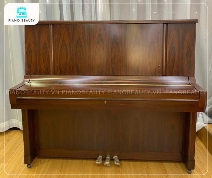 Đàn Piano Yamaha W107B có phần thân đàn được làm từ gỗ óc chó nguyên khối