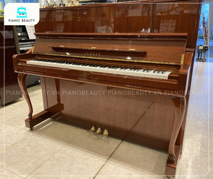 Đàn Piano Yamaha YU10MhC có lớp vỏ được làm bằng gỗ gụ Mahogany sang trọng