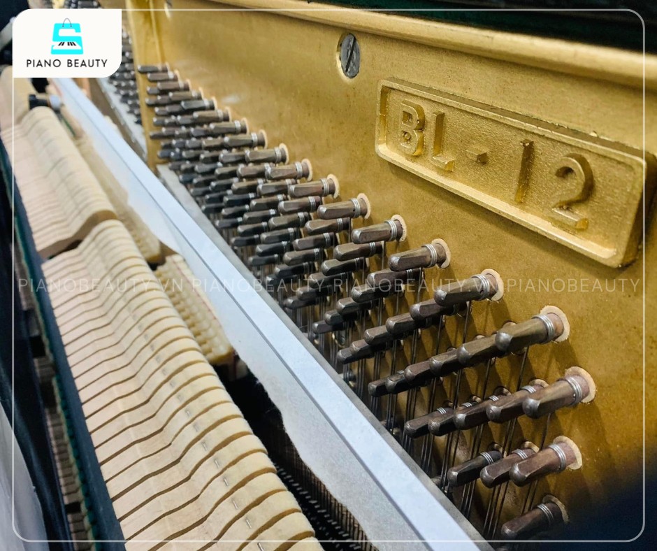 Bộ máy của đàn piano cơ Kawai BL12