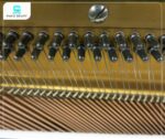 Trục giữ đây đàn piano cơ Yamaha U1E