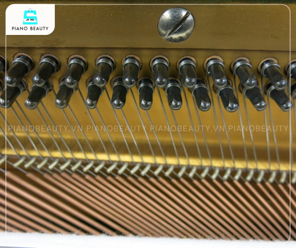 Trục giữ đây đàn piano cơ Yamaha U1E
