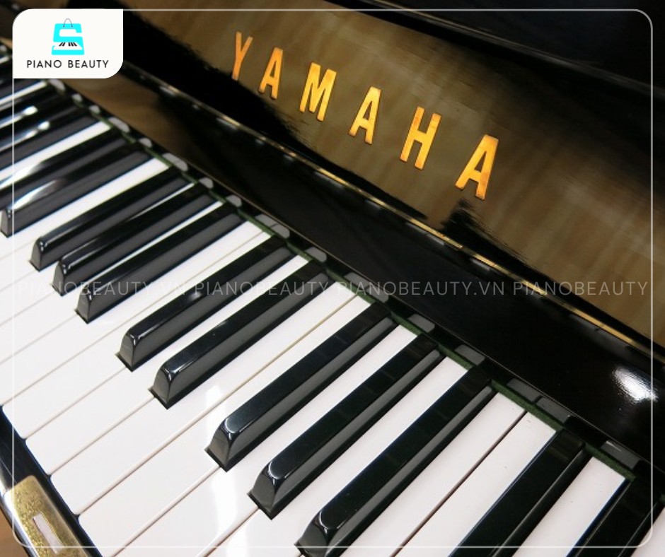 Đàn piano Yamaha U2C bàn phím phenolic resin bền bỉ và mượt mà