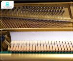 Búa đàn và trục giữ dây đàn của Yamaha UX